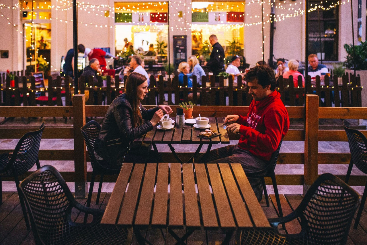 Elevate the classic by choosing a highly-rated restaurant and pairing it with an indie film or a timeless classic.