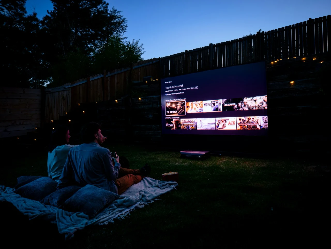 Attend a local outdoor movie screening in a park or drive-in theater — bring a blanket and snacks for the full experience.