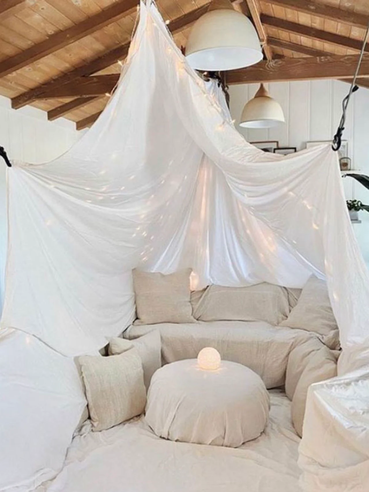 Recreate a childhood classic by building a blanket fort in your living room and watching a favorite movie inside.