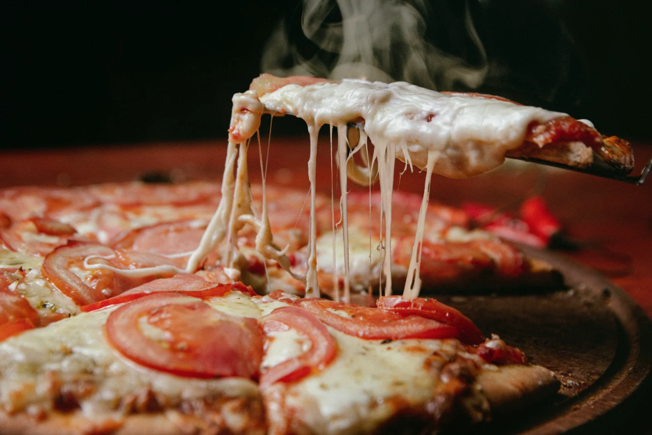 Buy pre-made dough and a variety of toppings, then make individual pizzas together and see whose creation turns out best.